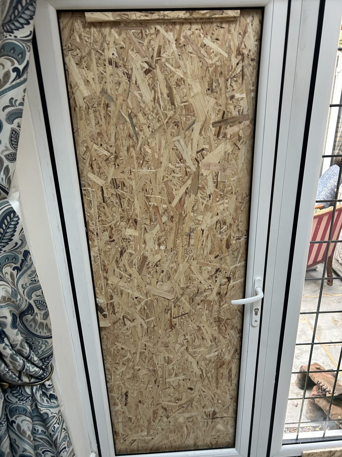 Boarded door made good — before, Surrey