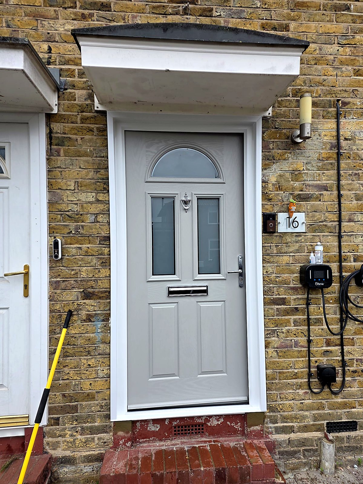 New grey composite front door fitted by K&R Locksmiths and Windows, Carshalton