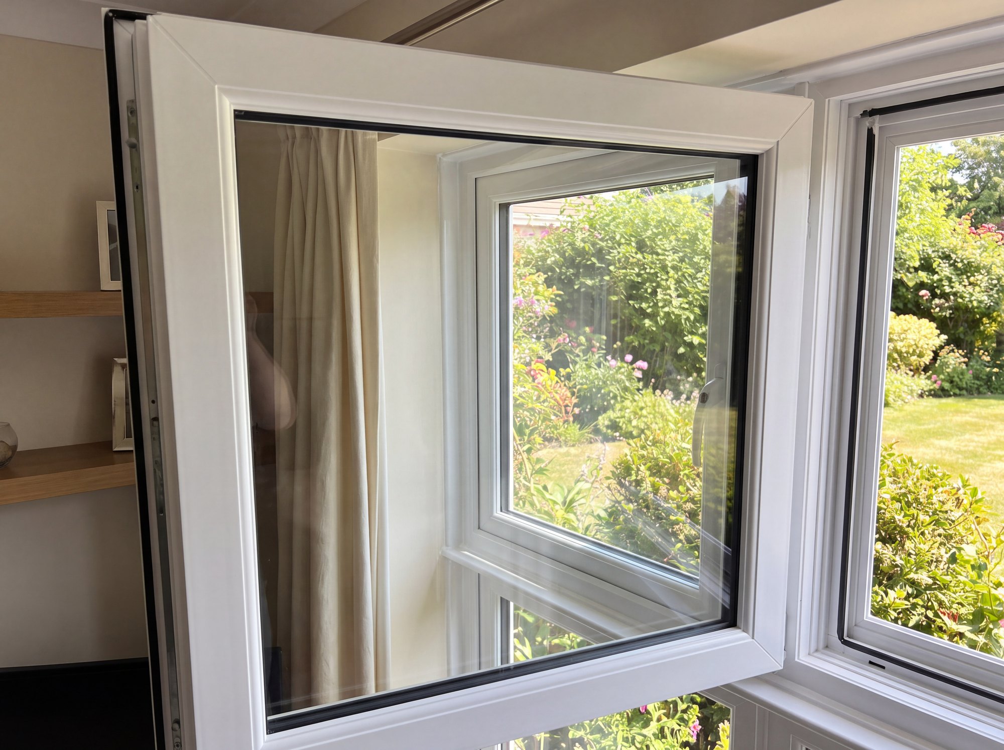 New crystal-clear sealed unit fitted into a uPVC window by K&R Locksmiths and Windows